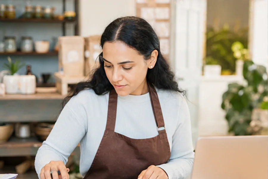 A bookkeeper at a small-business desk