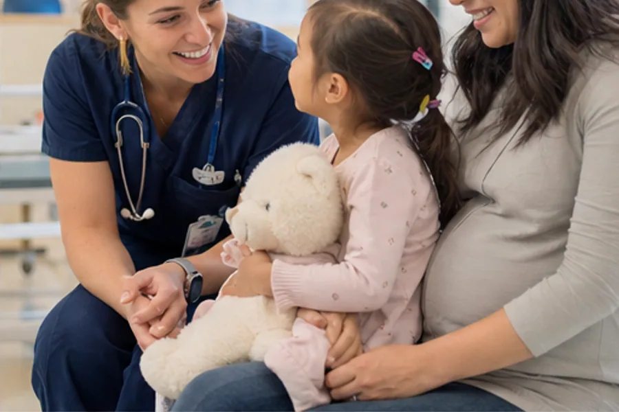 A pediatric unit hallway with bright windows